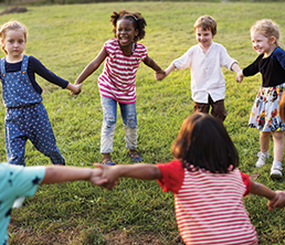 Extended Day Program: Children playing and holding hands